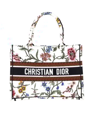VINTAGE, RRP AS NEW
The Dior Embroidered Medium Rosa Mutabilis Book Tote in multicolor canvas is a vibrant and artistic addition to your accessory collection. Adorned with an intricate floral embroidery design, this tote captures the essence of Dior's commitment to both luxury and craftsmanship. The matching multicolor canvas rolled handles and the iconic CHRISTIAN DIOR logo embroidered across the front bring a refined yet playful touch. With a spacious fabric interior, this tote is as functional as it is stylish, offering plenty of room for your essentials while making a bold fashion statement.



with Dust bag

Dior Embroidered Medium Rosa Mutabilis Book Tote in Multicolor Canvas
Condition: Excellent
Signs of wear: No retail tag, No visible sign of wear., 
Packaging: Dust bag
Color: Multicolor | multicolor
Material: Canvas
Size: One Size | One Size
Measurements: Width: 160; Height: 270; Length: 360; Handle drop: 170; Strap length: 380
SKU: NAPPUGBBA463238W