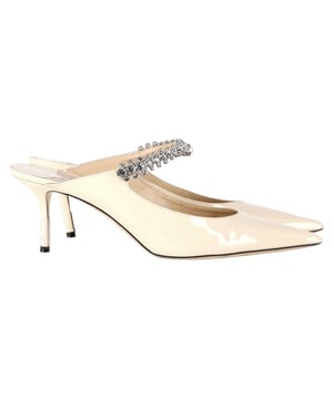 VINTAGE, RRP AS NEW
The Jimmy Choo Bing 65 Crystal-Embellished Mules in Cream Leather exude luxury and sophistication, featuring dazzling crystal embellishments that add a glamorous touch to the sleek, minimalist design. The soft cream leather and 65mm heel provide the perfect balance of elegance and comfort, making them ideal for both formal events and evening outings. Pair them with a chic cocktail dress or tailored trousers for a polished, refined look. Complete the ensemble with a metallic clutch and delicate jewelry to let the mules stand out as the statement piece of your outfit.

 Jimmy Choo Bing 65 Crystal-Embellished Mules in Cream Leather

Condition: Very good
Signs of wear: Include Box., Minor markings, Lightly used but very well maintained. Minor mark at soles & creasing, light scuffing at the soles and heels.
Packaging: Box
Color: White | cream
Material: Patent leather
Size: IT | 41
Measurements: Heel height: 70; Insole length: 280
SKU: NAPPUGBSH464059W