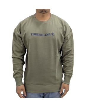Timberland Mens Graffiti Crew Sweats HUMUS Sweatshirt
Style Code : TB0A6BDT
80% Cotton, 20% Polyester
Made In Bangladesh
Relaxed Fit
Timberland® Tree Logo At The Front
Large Graphic Print At The Back Side
Machine Washable ( Please See Care Label )
Colour : Olive
Size : S-2XL