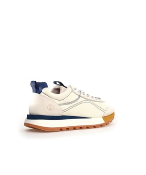 Sneaker with suede and cotton canvas upper featuring an antibacterial cork insole for enhanced freshness. Designed with a durable rubber sole for long-lasting wear and superior traction.