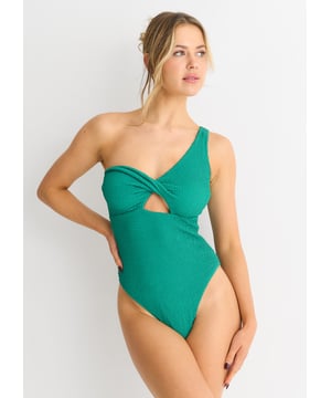 Atrae todas las miradas con nuestro bañador de un hombro verde con textura Twist Front. Este impresionante bañador de una pieza presenta un exclusivo diseño de torsión frontal y un tirante, que le da un aspecto sofisticado y elegante. El tejido texturizado añade un toque de elegancia, haciéndolo perfecto para cualquier ocasión. Luce tus curvas con este bañador imprescindible.