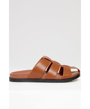 Add a timeless touch to your summer wardrobe with these classic sandals from Threadbare. Crafted from faux leather, these Roman-style sandals feature three straps and a central panel for a secure fit. A faux leather insole provides comfort, while the durable rubber sole offers flexibility and grip. Easy to slip on, they are perfect for warm-weather styling.