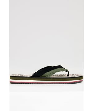 Step into effortless summer style with these standout floral fringed sandals from Threadbare. Featuring a fringed toe post strap for a relaxed, textured look, they are designed with a soft foam insole with a floral print for all-day comfort, whilst the durable rubber sole provides grip and support. Easy to slip on, they are perfect for the beach this summer.