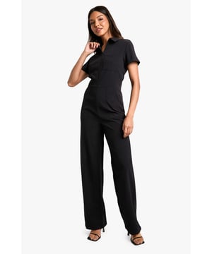 Chic collared neckline for a polished look
        Wide-leg silhouette for effortless comfort and style
        Convenient front zip closure for easy wear
        Short sleeves perfect for warmer days
        Versatile design suitable for various casual occasions
    
    Make a statement in this sleek and stylish wide-leg jumpsuit from Boohoo. The collared neckline and front zip closure add a touch of sophistication, while the relaxed fit ensures all-day comfort. Perfect for casual outings, family gatherings, or laid-back evenings with friends, this jumpsuit can be dressed up or down with ease. Pair it with flat sandals and a woven handbag for a chic daytime look, or add statement earrings and strappy heels for a night out. The short sleeves make it ideal for warmer weather, while the wide-leg trousers create a flattering silhouette that's both on-trend and timeless. Embrace effortless style with this versatile piece that's sure to become a go-to in your wardrobe.