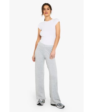 Wide leg design for a relaxed and comfortable fit
        High-waisted silhouette to elongate the legs
        Soft, stretchy fabric for all-day comfort
        Versatile style suitable for various casual occasions
        Pairs effortlessly with both fitted and loose-fitting tops
    
    These wide-leg trousers from Boohoo are the epitome of casual chic. Perfect for the fashion-forward woman who values both style and comfort, these trousers offer a relaxed fit that doesn't compromise on sophistication. The high-waisted design creates a flattering silhouette, while the wide-leg cut adds a touch of drama to your look. Style them with a fitted crop top and trainers for a laid-back daytime ensemble, or dress them up with a bodysuit and heels for an evening out. The versatility of these trousers makes them ideal for family gatherings, brunches with friends, or casual Fridays at the office. Their soft, stretchy fabric ensures you'll stay comfortable no matter where your day takes you. Embrace the latest trends while maintaining your personal style with these must-have wide-leg trousers.