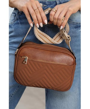 Our styles are designed with a trendy fitted look in mind following an international size standard. For the best fit we suggest choosing one size up from your usual. Be sure to check our sizing chart to find your perfect match!
  Stylish faux leather construction
  Sophisticated quilted design
  Adjustable strap for personalized comfort
  Compact size: 22
  6
  16cm
Material: PU Leather