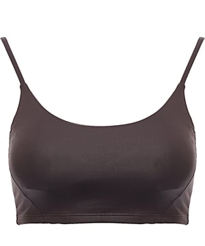 Main: 82% Polyester, Main: 18% Elastane Shine bright during your workouts with the South Beach light support strappy high shine sports bra in brown. This stylish sports bra features a high-shine finish that adds a touch of glamour to your fitness wardrobe. Designed for light support, it is perfect for low-impact activities such as yoga, pilates, or casual wear. The strappy design not only provides a secure fit but also adds a fashionable flair. Made from a blend of 82% polyester and 18% elastane, this sports bra offers excellent stretch and durability, ensuring you stay comfortable and confident during your workouts. The rich brown color adds a sophisticated touch, making it a versatile piece for any activewear collection.