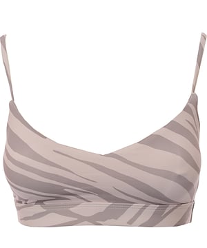 Main: 80% Polyester, Main: 20% Elastane Unleash your wild side with the South Beach x Joanna Chimonides light support strappy sports bra in mink animal print. This stylish sports bra features a bold animal print that adds a touch of fierce fashion to your workout wardrobe. Designed for light support, it is perfect for low-impact activities such as yoga, pilates, or casual wear. The strappy design not only provides a secure fit but also adds a fashionable flair. Made from a blend of 80% polyester and 20% elastane, this sports bra offers excellent stretch and durability, ensuring you stay comfortable and confident during your workouts. The collaboration with Joanna Chimonides brings a unique and trendy touch to this versatile piece.