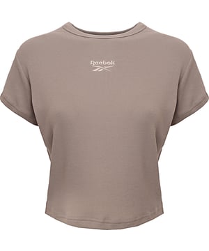 Body: 97% Cotton, Body: 3% Elastane Elevate your casual wardrobe with the Reebok Ribbed Crop T-Shirt. This stylish t-shirt, in a versatile oatmeal grey, features a ribbed texture that adds a touch of sophistication to your look. Made from a comfortable blend of 97% cotton and 3% elastane, it offers a soft and stretchy fit that moves with you. The cropped length makes it perfect for pairing with high-waisted jeans or leggings, while the minimalist design ensures it can be dressed up or down. Whether you?re heading out for a casual day or lounging at home, this ribbed crop t-shirt combines comfort and style effortlessly.