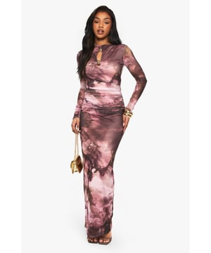 Striking floral mesh maxi dress with long sleeves
        Eye-catching keyhole neckline with decorative hardware
        Figure-hugging silhouette for a flattering fit
        Soft jersey fabric for comfort and ease of movement
        Versatile design suitable for various evening occasions
    
    Make a lasting impression with this captivating floral mesh maxi dress from Boohoo. The long-sleeved design features an alluring keyhole neckline adorned with stylish hardware, creating a focal point that draws the eye. The figure-hugging silhouette accentuates your curves, whilst the soft jersey fabric ensures comfort throughout your night out. Perfect for those seeking to turn heads at the club or during a night on the town, this dress effortlessly combines style and comfort. Pair with strappy heels and statement earrings to complete your look. Whether you're meeting friends for drinks or dancing the night away, this versatile piece will keep you looking chic and feeling confident from dusk till dawn.