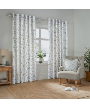 Transform your home into a tranquil retreat with Meadow Room Darkening Eyelet Curtains. Crafted from 100% cotton Panama, these curtains combine a timelessly durable finish with a delicate floral print inspired by summer meadows, bringing a natural serenity to any interior. Their soft hues complement modern and classic decor alike, creating a harmonious blend of style and warmth. Designed for easy hanging with their convenient eyelets, they gently filter light to produce a cosy and inviting atmosphere. Perfect for those who value thoughtful design and the beauty of nature, these curtains add a refined touch to your living space.