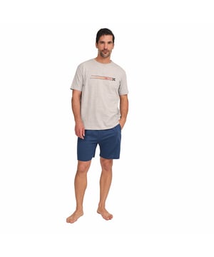 These men's short-sleeved pajamas combine comfort and style in a fresh and relaxed set, perfect for resting in comfort and looking good even at home.

 Details:

 T-shirt:
 - Relaxed fit.
 - Round neck.
 - Short sleeve.
 - Front print.

 Short:
 - Short and baggy.
 - Side pockets.
 - Elastic waistband.
 - Light and cool fabric for the warmest nights.
 - Tone-on-tone visible seams.

 For those seeking a restful night's sleep, MUNICH's luxurious short-sleeved pyjama sets are just the ticket. Crafted from the finest fabrics and with an attention to detail unmatched in the industry, these comfortable and stylish men's short-sleeved pyjamas will ensure you sleep in luxury each and every night.
 Composition: T-shirt: 95% Cotton, 5% Viscose; Shorts: 50% Modal, 50% Cotton
 Care:
Machine wash max. 30ºC.
 Use mild detergent.
 Avoid bleaches.
 Dry at low temperature.
 Iron at low temperature.