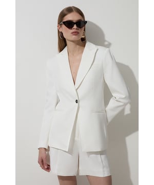 The perfect choice for transitioning seasons , this jacket is designed with a relaxed fit and a simple, easy to style design. Style it with anything, from jeans to the matching tailored separates for looks that will take you from office days to coffee catch ups. Tailored Viscose Linen Single Breasted Blazer Jacket High Quality Linen Fabric Plunging V Neckline Comfortable, Relaxed Fit Pocket Accents Button Front Fastening Matching Trousers Sold SeparatelyShop this seasons blazers or browse the full collection of coats and jackets now.