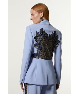 From statement glamour to understated elegance, this latest selection of occasion wear covers every moment. High-impact details serve the dramatic dresser, while sleek tailoring and monochrome combinations cater to those with a polished and pared-back aesthetic. Make a statement with our striking blazer, which features a dramatic, applique design and double breasted buttons. Style it simply with the matching trousers and heeled boots or statement heels for a look that will take you from race days to party season events. Lace Applique Contrast Tailored Tuxedo Jacket Flattering Fitted Silhouette V Neckline Contrasting Lace Applique Accent and Buttons Classic Double Breasted Button Detailing Matching Trousers Sold SeparatelyDiscover our collection of occasion wear or browse our range of women's occasion dresses now.