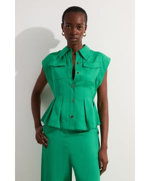 Add a little formality in our tall blouse. The linen fabric is breathable and comfortable, and the cinched waist seams make for an ultra flattering silhouette. This piece pairs well with anything, from the matching separates, to tailored trousers, to jeans for an elevated daytime look. Tall Premium Viscose Linen Topstitch Waist Seam Woven Blouse High Quality Linen Fabric Statement Pintucked Design Classic Collared Neckline Fitted Silhouette Sleeveless Design Button Front Fastenings Matching Pieces Sold Separately Expertly designed for those 5'10" and above, our Tall pieces are perfectly proportioned for a taller frame using longer lengths.Browse this seasons tall tops or discover the full range of tall clothing now.