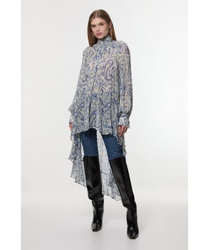 Embrace the boho trend with this elegant maxi top. Featuring long sleeves, frill details, and a paisley print design, this piece makes an elevated choice for daytime plans. Style this top with tailored trousers and leather boots and a matching leather jacket for a put-together everyday outfit. Viscose Crinkle Paisley Frill Detail Tunic Textured, Frill Detailing Classic Paisley Print Formal, High Neckline High Low Hemline Long SleevesDiscover this seasons casual tops or browse the full collection of women's tops now.