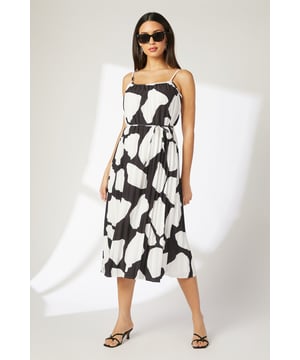 Elegant square neckline with delicate adjustable straps for a personalised fit
        Eye-catching geometric print in a striking monochrome palette
        Pleated fabric adds texture and movement to this midi-length dress
        Flattering tie waist detail to accentuate your silhouette
        Versatile midi length perfect for various daytime occasions
    
    This Principles dress showcases a bold geometric print that makes a statement without trying too hard. The pleated fabric creates beautiful movement as you walk, while the square neckline frames your dcolletage with modern elegance. Style with flat sandals and oversized sunglasses for a casual weekend brunch, or pair with statement earrings and strappy sandals for garden parties and family gatherings. The tie waist detail allows you to customise the fit to your preference, creating a feminine silhouette that works beautifully for daytime events. Layer with a lightweight denim jacket when the temperature drops, or add a crossbody bag for a practical yet stylish finishing touch to your ensemble.