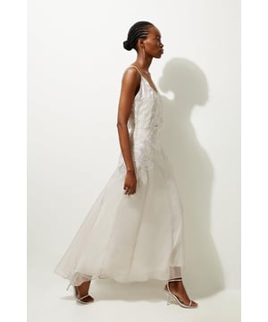 Experience elegance in our maxi dress, made with a floaty outer layer and satin applique detailing, as well as a universally flattering fit and flare silhouette, and a strappy back that brings the drama. Style it with strappy heels for a look ideal for prom nights and wedding guest days. Satin Applique Woven Maxi Dress High Quality Woven Fabric Floral Applique Detailing Made of Satin Flattering Fit and Flare Silhouette Plunging V Neckline Strappy Back Design