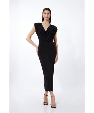 Elegant cowl neck design for a sophisticated drape Figure-flattering jersey fabric with gentle stretch Sleek maxi length for a statuesque silhouette Versatile sleeveless style perfect for layering Effortlessly chic design suitable for various occasions  Embrace effortless elegance with this Karen Millen Cowl Neck Jersey Maxi Dress. The gracefully draped neckline adds a touch of sophistication, while the sleek maxi length elongates your silhouette for a truly statuesque look. Crafted from a soft jersey fabric, this dress offers both comfort and style, making it an ideal choice for a range of daytime events. Style it with strappy sandals and statement gold jewellery for a casual yet refined ensemble perfect for family gatherings or brunch dates. For a more relaxed look, pair with trendy trainers and a denim jacket. The versatile design allows for easy transition from day to night " simply swap your flats for a pair of wedges and add a clutch for evening drinks or dinner parties. This dress is a wardrobe essential that combines timeless elegance with modern comfort.