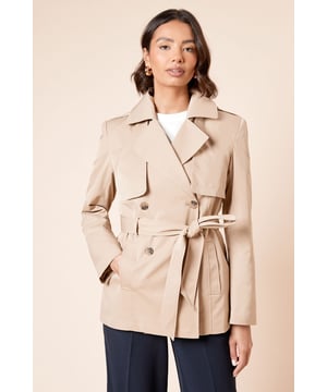 Double-breasted design with classic notched lapels for a timeless silhouette
        Adjustable belted waist to create a flattering, feminine shape
        Practical storm flap detail adds authentic trench coat styling
        Functional side pockets perfect for keeping essentials close at hand
        Versatile mid-length cut suitable for layering throughout the seasons
    
    This Dorothy Perkins trench coat offers the perfect balance of classic style and modern practicality. The double-breasted design creates a structured look that can be dressed up or down with ease, while the belted waist allows you to customise the fit to your preference. Style with straight-leg trousers and white trainers for casual weekend brunches, as seen on our model, or pair with a midi dress and ankle boots for family gatherings. The collared neckline and clean lines make this coat a wardrobe essential that transitions effortlessly from work to weekend. For cooler days, layer over a lightweight jumper and finish with gold-toned jewellery for a polished look that's perfect for coffee dates or shopping trips with friends. This versatile piece will quickly become your go-to outerwear option for unpredictable British weather.