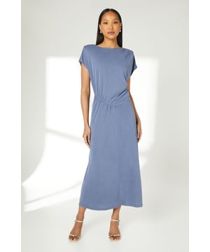 Elegant cupro jersey midi dress with sophisticated ruched detailing at the waist
        Flattering crew neckline and relaxed cap sleeves for effortless comfort
        Soft, stretchy fabric that gently drapes over the figure
        Versatile midi length perfect for day-to-evening transitions
        Subtle back detail with small keyhole opening for added interest
    
    This Principles jersey midi dress showcases thoughtful design with its distinctive ruched waist detail that creates a naturally flattering silhouette. The relaxed fit through the bodice contrasts beautifully with the more defined waistline, offering both comfort and style. Style with minimal strappy sandals as shown for casual daytime events, or dress up with statement earrings and a clutch bag for family gatherings. The versatile midi length works wonderfully for garden parties, brunches, or gallery visits. Layer with a lightweight cardigan and trainers for a more casual approach, or add a structured blazer for lunch dates. The stretchy jersey fabric ensures all-day comfort whilst maintaining its elegant drape, making this a wardrobe essential that transitions seamlessly from season to season.
