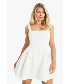 Dazzling paillette-embellished boucle fabric
        Flattering square neckline
        Sleeveless design for a chic look
        Mini length to show off your legs
        Fit and flare silhouette for a feminine touch
    
    Make a statement at your next night out with this eye-catching paillette boucle mini dress from Boohoo. The textured fabric adds depth and intrigue, while the square neckline frames your dcolletage beautifully. Perfect for those who love to be at the centre of attention, this dress is ideal for clubbing, cocktails with the girls, or any event where you want to shine. Style it with strappy heels and a clutch bag for a polished look, or dress it down with white trainers for a more casual vibe. The versatile design allows for endless styling options, ensuring you'll stand out in the crowd wherever the night takes you. This dress is a must-have for the fashion-forward woman who isn't afraid to dazzle.
