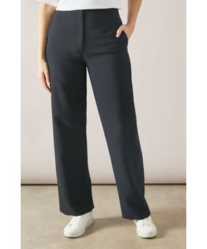 Tailored tapered design for a sophisticated silhouette
        Comfortable regular fit with a flattering waistline
        Versatile woven fabric suitable for various occasions
        Sleek side pockets for practicality and style
        Full-length trousers with a modern straight leg
    
    Embrace effortless elegance with these tailored tapered trousers from Wallis. Perfect for the woman who appreciates both comfort and style, these trousers offer a regular fit that flatters various body types. The tapered design creates a sleek silhouette, making them ideal for casual daywear or smart-casual events. Style them with a crisp white blouse and trainers for a chic everyday look, or pair them with a matching blazer for a coordinated ensemble that's perfect for family gatherings or casual work environments. The versatile nature of these trousers allows for easy transition from day to night - simply swap your flats for a pair of low heels and add some statement jewellery for an evening out. With their timeless design and comfortable fit, these trousers are sure to become a staple in your wardrobe, offering endless styling possibilities for the sophisticated woman on the go.