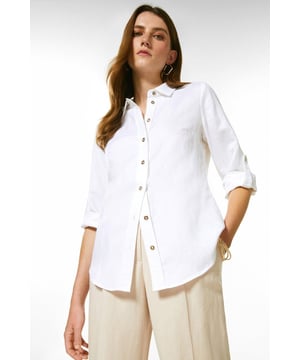 Timeless tailoring is presented with a proportional twist for this lightweight viscose linen shirt. This crisp piece has a point collar detailed with polished golden embossed buttons, and long sleeves. Pair this piece with tailored shorts and flats for a summer ensemble.Point collarButton detailingShirt