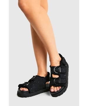 Boucle fabric for unique texture and comfort
        Wide fit design for enhanced comfort
        Adjustable buckle straps for a customised fit
        Chunky sole for added height and durability
        Flat heel between 0 and 2cm for all-day wear
    
    Step into comfort and style with these trendy dad sandals. The boucle fabric adds a distinctive texture, while the wide fit ensures ample room for your feet. Perfect for casual outings, these sandals can be effortlessly paired with a variety of looks. Try them with cropped wide-leg trousers and an oversized tee for a relaxed weekend brunch, or slip them on with a floaty midi dress for a garden party. The adjustable straps allow you to customise the fit, making them ideal for long walks or busy days on your feet. The chunky sole not only adds a fashionable edge but also provides excellent support. Whether you're running errands or meeting friends for a casual catch-up, these versatile sandals will keep you looking chic and feeling comfortable all day long.