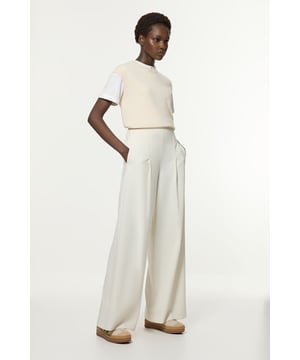 Experience elevated tailoring in a pair of wide leg trousers, with a flattering, relaxed fit and a comfortable high waistline. The sleek design makes them easy to style with anything, from a button up shirt for a formal look, or with a T-shirt and trainers for a more laid back approach. Compact Stretch Essential Wide Leg Tailored Trouser High Quality Stretch Fabic Comfortable High Waistline Flattering Wide Leg Fit Sleek, Minimal Design