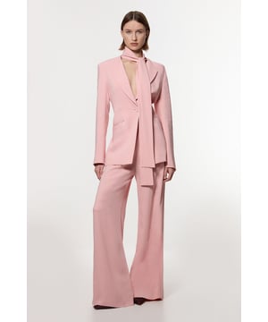 Experience elevated tailoring in a pair of wide leg trousers, with a flattering, relaxed fit and a comfortable high waistline. The sleek design makes them easy to style with anything, from a button up shirt for a formal look, or with a T-shirt and trainers for a more laid back approach. Compact Stretch Viscose Wide Leg Tailored Trouser High Quality Stretch Fabic Comfortable High Waistline Flattering Wide Leg Fit Sleek, Minimal Design Matching Pieces Sold Separately