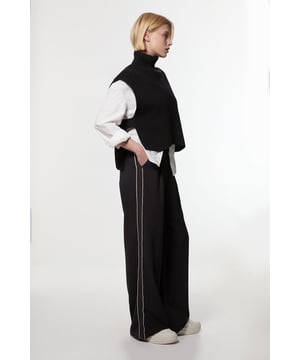 Experience elevated tailoring in a pair of wide leg trousers, featuring a flattering, relaxed fit and contrasting stripe detailing down the sides. The sleek design makes them easy to style with anything, from the matching blazer for a formal look, or with a T-shirt and trainers for a more laid back approach. Soft Tailored Contrast Tipped Wide Leg Trouser Comfortable High Waistline Flattering Wide Leg Fit Contrasting Trim Detailing Down Sides Sleek, Minimal Design Matching Blazer Sold Separately