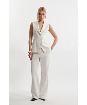 Experience sleek tailoring in a pair of straight leg trousers, with a flattering, relaxed fit and a comfortable high waistline. Style it with the matching waistcoat for a co-ordinating look, or with a knit jumper and boots for a more laid back approach. Compact Stretch Essential Tailored Straight Leg Trouser High Quality Tailored Design Comfortable High Waistline Flattering Straight Leg Fit Pocket Accents Matching Waistcoat Sold SeparatelyShop this seasons straight leg trousers or browse the full collection of women's trousers now.