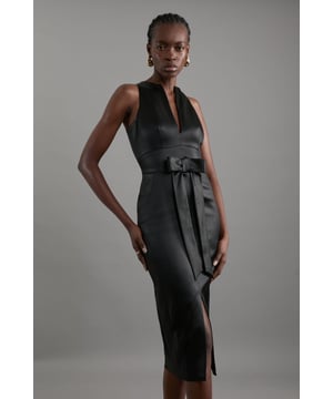 Experience pure opulence in our midi dress, made with shimmering satin, featuring a deep V neckline and a figure hugging silhouette, and a large bow for a touch of playful glamour. Style it with block heels or strappy heels for a look perfect for wedding guest days and prom nights. Italian Structured Satin Bow Detail Tailored Midi Dress High Quality, Smooth Satin Fabric Flattering Fitted Silhouette Plunging V Neckline Statement Bow Belt at Waistline Thigh High Leg Split Zip Fastening in Back Expertly designed for those 5'3" and under, our Petite pieces are perfectly proportioned for a smaller frame using shorter lengths.Discover this seasons evening dresses or browse the full collection of women's dresses now.