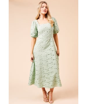 Elegant square neckline framed by charming puff sleeves for a feminine silhouette
        Intricate lace detailing throughout the fabric creates a sophisticated texture
        Flattering midi length that falls gracefully below the knee
        Soft cotton-rich fabric offering comfort without compromising on style
        Subtle A-line shape that skims the figure beautifully
    
    The DP Luxe Lace Puff Sleeve Midi Dress from Dorothy Perkins presents the perfect balance of elegance and comfort for your special occasions. The delicate lace pattern adorning the fabric adds a touch of romance, while the square neckline and puff sleeves create a timelessly feminine aesthetic. Style with strappy heeled sandals as shown for garden parties or summer weddings, or layer with a tailored blazer and court shoes for more formal events. The versatile midi length makes this dress appropriate for everything from baby showers to race day outings. For cooler evenings, pair with a lightweight pashmina and subtle jewellery to maintain the dress's refined charm. This Dorothy Perkins piece transitions effortlessly from daytime celebrations to evening gatherings, making it a wardrobe essential for the woman who appreciates classic style with contemporary details.