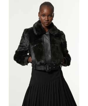 Feel elevated no matter the weather in our petite cropped jacket, made in high quality, thick faux fur, contrasted with sleek faux leather detailing. Wear it over any outfit, whether heading out for dinner or to the office. Petite Faux Fur Pu Panelled Belted Cropped Jacket High Quality, Thick Faux Fur Fabric Flattering Relaxed Fit Belted Waistline Contrasting Faux Leather Detailing Cropped Length Warm, Wide Collar Expertly designed for those 5'3" and under, our Petite pieces are perfectly proportioned for a smaller frame using shorter lengths.