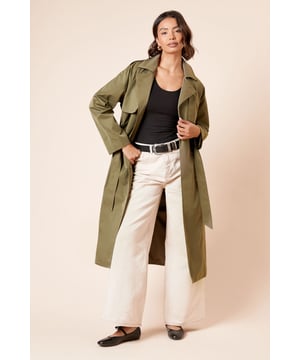 Classic double-breasted design with statement buttons for timeless appeal
        Adjustable belted waist to create a flattering silhouette
        Longline cut offering extra coverage and sophisticated drape
        Practical storm flaps and shoulder epaulettes for authentic trench styling
        Collared neckline with wide lapels for a structured, polished finish
    
    This Dorothy Perkins longline trench coat combines practicality with effortless style for your everyday wardrobe. The adjustable belt allows you to customise the fit according to your outfit, whether worn loosely for a relaxed look or cinched to define your waist. Style with wide-leg trousers and loafers as shown for a contemporary daytime ensemble, or layer over a casual dress with trainers for weekend brunches with friends. The regular fit accommodates light layering underneath, making it ideal for transitional weather. Perfect for family gatherings, coffee dates or shopping trips, this versatile coat will quickly become your go-to outerwear option. The woven fabric offers structure while maintaining a fluid movement that complements various silhouettes, ensuring you stay stylishly comfortable throughout the day.