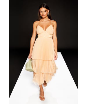 Pleated bodice with strappy design for a flattering silhouette
        Tiered chiffon skirt creates a romantic, flowing effect
        V-neckline accentuates the dcolletage
        Adjustable spaghetti straps for a customised fit
        Midi length perfect for various formal occasions
    
    This Warehouse Runway 1.8.1.8 dress radiates sophistication and femininity. The pleated bodice with its strappy design creates a figure-flattering look, while the tiered chiffon skirt adds movement and drama. Perfect for weddings, races, or any formal event, this dress can be styled to suit your personal taste. Pair with strappy heels and delicate jewellery for a classic look, or add bold statement earrings for a more contemporary edge. The versatile midi length allows for easy transition from day to evening events. For cooler evenings, drape a tailored blazer over your shoulders for added elegance. This dress is a stunning choice for the confident woman who wants to make a lasting impression at her next special occasion.