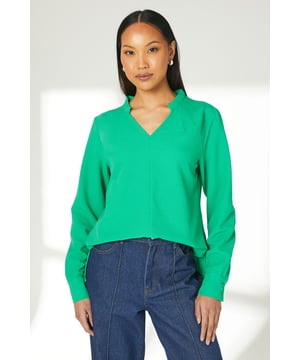 Textured woven fabric for added visual interest
        V-neckline with subtle collar detail
        Long sleeves with button cuffs for a polished look
        Relaxed fit through the body for comfort and ease of movement
        Curved hemline adds a feminine touch to the silhouette
    
    This versatile long sleeve top from Principles is a wardrobe essential that can be styled for various casual occasions. The textured fabric adds depth to your outfit, while the v-neckline with its subtle collar detail creates a flattering frame for your face. Pair it with wide-leg jeans and trainers for a relaxed weekend look, or tuck it into a midi skirt with ankle boots for a smart-casual ensemble perfect for family gatherings. The curved hemline allows for effortless styling, whether worn loose or tucked in. For a laid-back daytime look, layer it under a denim jacket and accessorise with a crossbody bag. The regular fit ensures comfort throughout the day, making it an ideal choice for running errands or meeting friends for a casual lunch.