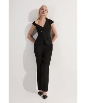 These Karen Millen Compact Stretch Slim Leg Tailored Trousers are the epitome of refined workwear. The slim fit design creates a streamlined look that's both modern and professional. Perfect for the office, these trousers can be styled with a crisp white shirt and blazer for a classic ensemble. The stretch fabric ensures all-day comfort, allowing you to move with ease from morning meetings to evening functions. For a more relaxed yet put-together look, pair with a silk blouse and pointed flats. The versatility of these trousers makes them a wardrobe staple, easily transitioning from day to night with a simple change of accessories. Whether you're presenting to clients or attending a business dinner, these trousers will help you project confidence and sophistication.  Slim leg tailored trousers for a sleek silhouette Compact stretch fabric for comfort and ease of movement Versatile design suitable for various professional settings Clean-cut waistband for a polished appearance Full-length style with a sophisticated straight leg