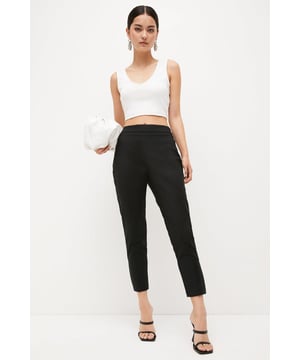 A true wardrobe signature, threaded with this seasons contemporary styling. Characterised by an exposed silver tone side zip that boasts modern appeal, the tailored trousers define the waist with a high rise. They form a seamless construction that skims the silhouette with bespoke appeal. Built for season-to-season styling, pair with the rotation of your well-curated wardrobe for casual and formal affairs alike.Browse this seasons women's petite trousers or shop the full collection of women's petite clothing now.