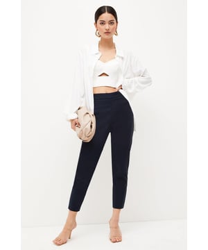 A true wardrobe signature, threaded with this seasons contemporary styling. Characterised by an exposed silver tone side zip that boasts modern appeal, the tailored trousers define the waist with a high rise. They form a seamless construction that skims the silhouette with bespoke appeal. Built for season-to-season styling, pair with the rotation of your well-curated wardrobe for casual and formal affairs alike.Browse this seasons women's petite trousers or shop the full collection of women's petite clothing now.