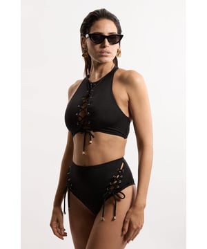 Experience elevated confidence in our halter neck bikini. This piece features a supportive design, accentuated with a strappy design and a secure full coverage design. Style this piece with the matching bikini bottoms and strappy sandals for a holiday outfit perfect for beach clubs, pool parties, and spa days. Slinky Tie Detail Bikini Top Supportive, Wide Shoulder Straps Statement Stitched Design Comfortable, Wide Shoulder Straps SecureFull Coverage Design Halter Bikini Top Style Metallic Clasp Fastenings in Back Matching Bikini Bottoms Sold Separately