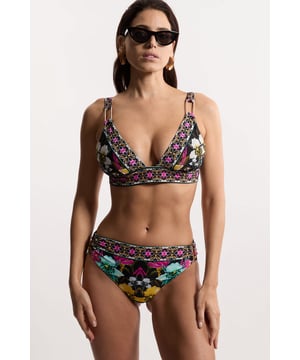 Get holiday ready with our bikini top, featuring a flattering plunge neckline, floral pattern, and ring detail. Pair with the matching bikini bottoms, a beach cover-up, and sandals for a day at the pool, or dress it up with wedges and jewellery for an elegant beach club look. Mirror Print Plunge Bikini Top Ring Detail Vibrant Floral Print Plunge Neckline Thick, Supportive Straps Matching Bottoms Sold Seperately