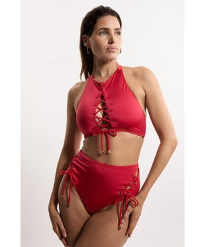 Experience elevated confidence in our halter neck bikini. This piece features a supportive design, accentuated with a strappy design and a secure full coverage design. Style this piece with the matching bikini bottoms and strappy sandals for a holiday outfit perfect for beach clubs, pool parties, and spa days. Slinky Tie Detail Bikini Top Supportive, Wide Shoulder Straps Statement Stitched Design Comfortable, Wide Shoulder Straps SecureFull Coverage Design Halter Bikini Top Style Metallic Clasp Fastenings in Back Matching Bikini Bottoms Sold Separately