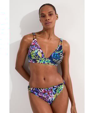 Make a splash this season with Karen Millen's eye-catching Tropical Floral Plunge Bikini Top. This striking piece combines an exotic floral pattern with zebra print elements. The plunging neckline adds a touch of allure, perfect for those seeking to make a statement poolside or on the beach. Adjustable straps ensure a customised fit, while the supportive under-bust band provides comfort for all-day wear. Whether you're lounging by the pool or enjoying a beachside cocktail, this bikini top is perfect for sunny days. Pair it with the matching bottoms for a coordinated look, or mix it up with a solid-coloured bottom to showcase your personal style. This Karen Millen piece is sure to become your go-to swimwear for hot destinations and summer getaways.  Vibrant tropical floral print with bold zebra accents Plunging neckline for a daring and alluring look Adjustable straps with sleek metal hardware Supportive under-bust band for enhanced comfort Versatile design suitable for mix-and-match styling