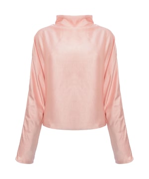 Main: 97% Polyester, Main: 3% Elastane. The Pretty Lavish high neck backless blouse in blush pink is the epitome of sophistication and elegance. With its long sleeves, it offers a graceful silhouette that's perfect for any upscale event or a chic day at the office. The backless design adds a touch of allure, making it a stunning statement piece that's sure to turn heads. This blouse is a beautiful blend of modern style and timeless sophistication.