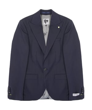 The Twisted Tailor Buscot suit jacket in navy features peak lapels, a single button fastening, and multiple pockets both inside and out, all in a regular fit and crafted from 36% polyester, 64% cotton.
