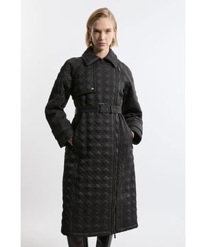 Be protected from the elements in our trench coat, made in high quality, thick, padded fabric, featuring a quilted design, and cinched detailing at the waist. Wear it over any outfit, whether heading out for a wintery walk or to the office. Quilted Belted Longline Trench Coat High Quality, Textured Fabric Comfortable, Relaxed Silhouette Textured, Quilted Detailing Belted Waistline Pocket Features Warm, High Neckline Knee Length DesignShop this seasons trench coats or browse the full collection of coats and jackets now.