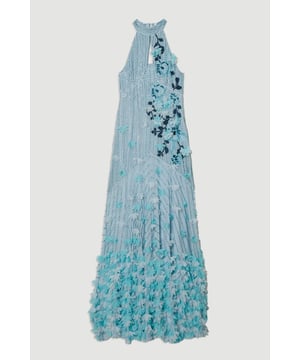 This breathtaking Karen Millen maxi dress commands attention with its show-stopping design, featuring a halterneck neckline that creates an elegant frame and intricate embroidery and applique work. Perfect for formal occasions, this dress pairs beautifully with minimal jewellery to let the embellishments shine - think delicate drop earrings and a simple bracelet. For summer weddings or gala events, complement with strappy heeled sandals and a small clutch bag. The flowing silhouette and textured hem create a graceful movement as you walk, ensuring all eyes are on you. This statement piece requires little additional styling; simply add a tailored evening jacket should the temperature drop. A truly remarkable dress that reflects the distinctive elegance synonymous with the Karen Millen brand.  Stunning halterneck maxi dress adorned with intricate embroidery and delicate applique detailing Elegant crew neckline with sleeveless design for a sophisticated silhouette Exquisite sequin and bead embellishments creating a textural masterpiece Dramatic floor-sweeping length Striking floral applique cascading down the dress with beautiful textured hem detailing